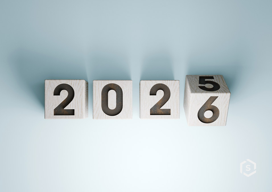 Blocos de madeira com números formando o ano 2026, representando a passagem do ano de 2025 nos condomínios